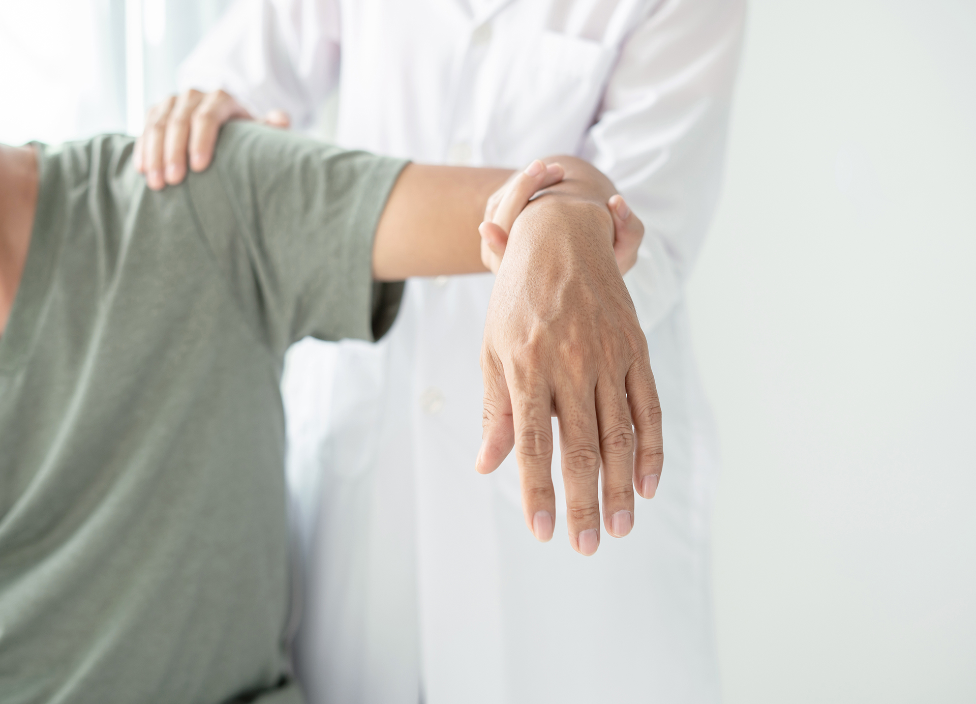 Female physiotherapists provide physical assistance to male pati